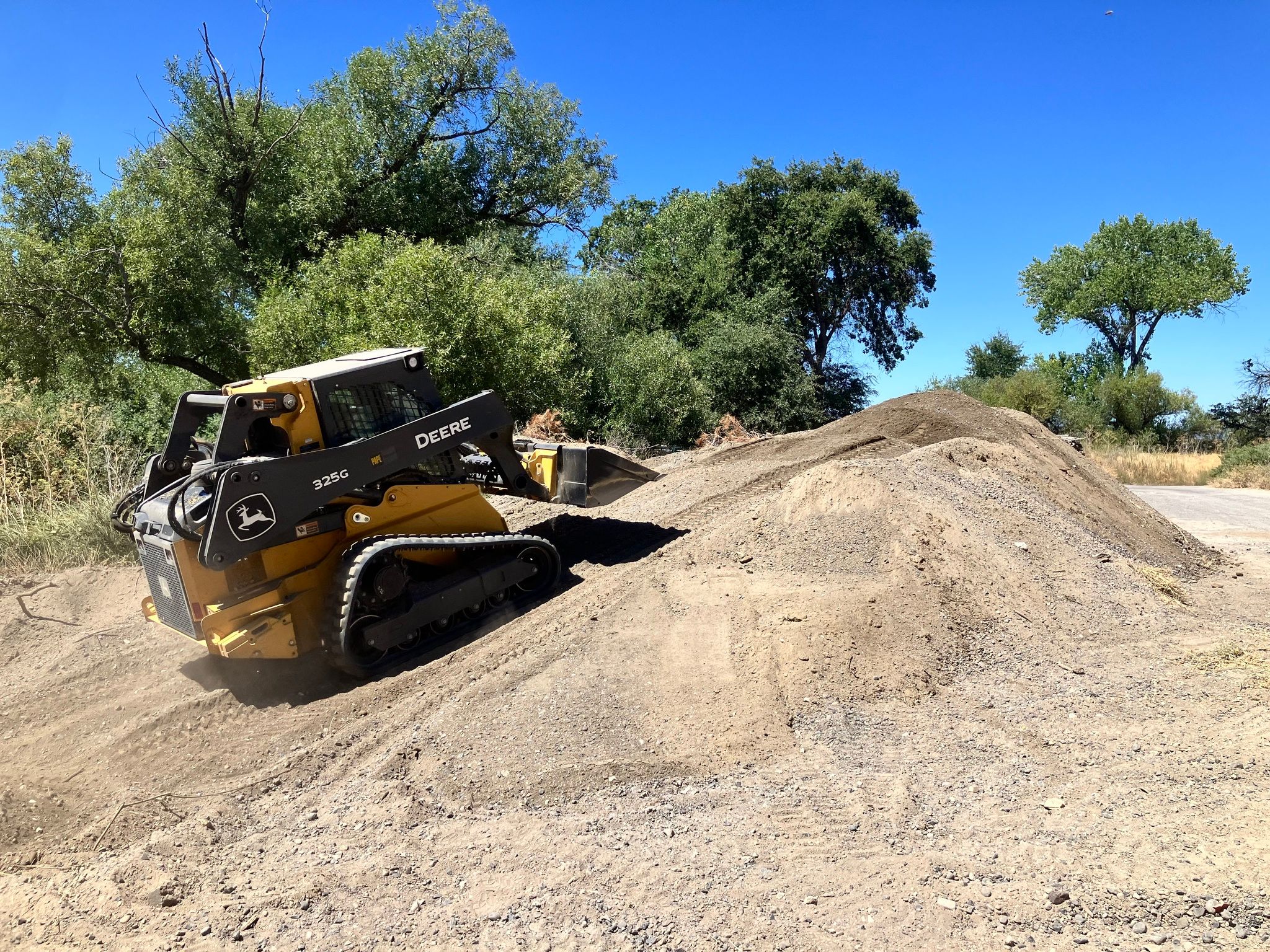 Sediment staged after excavation near Clark Drive Bridge
