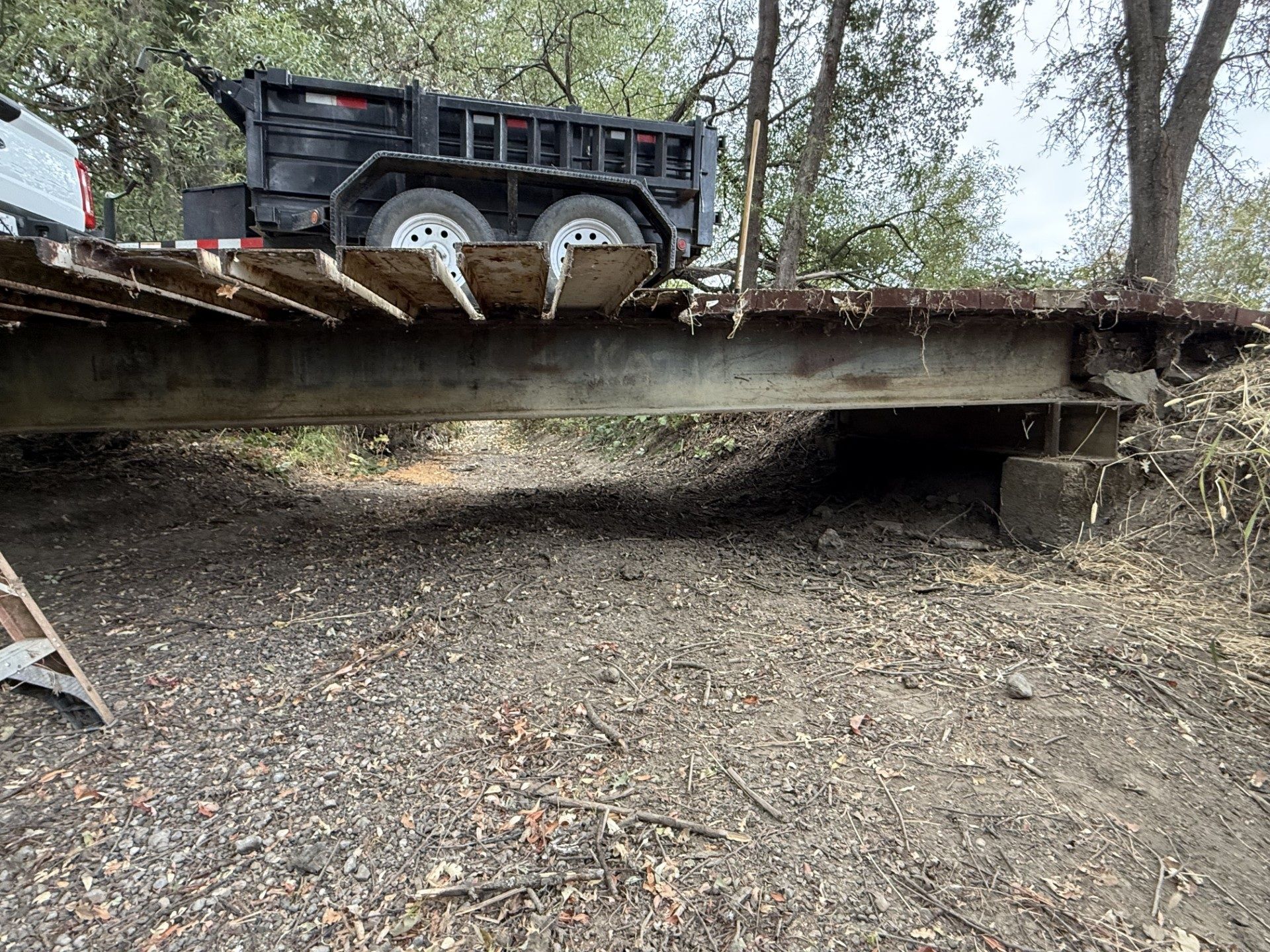 Cole Creek beneath the bridge after crews removed the accumulated debris