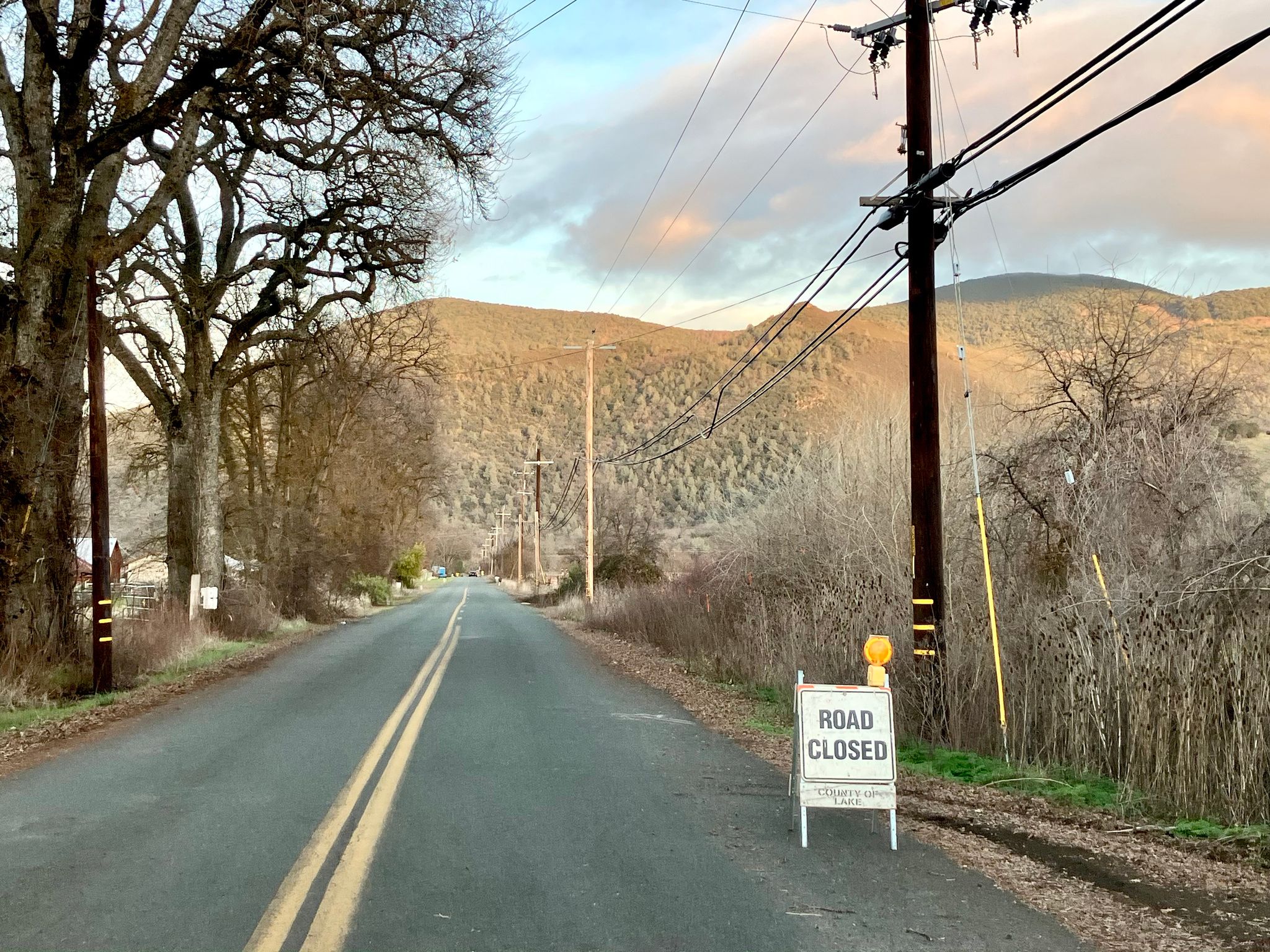 Road closed sign on Clark Dr during flooding (February 2025)