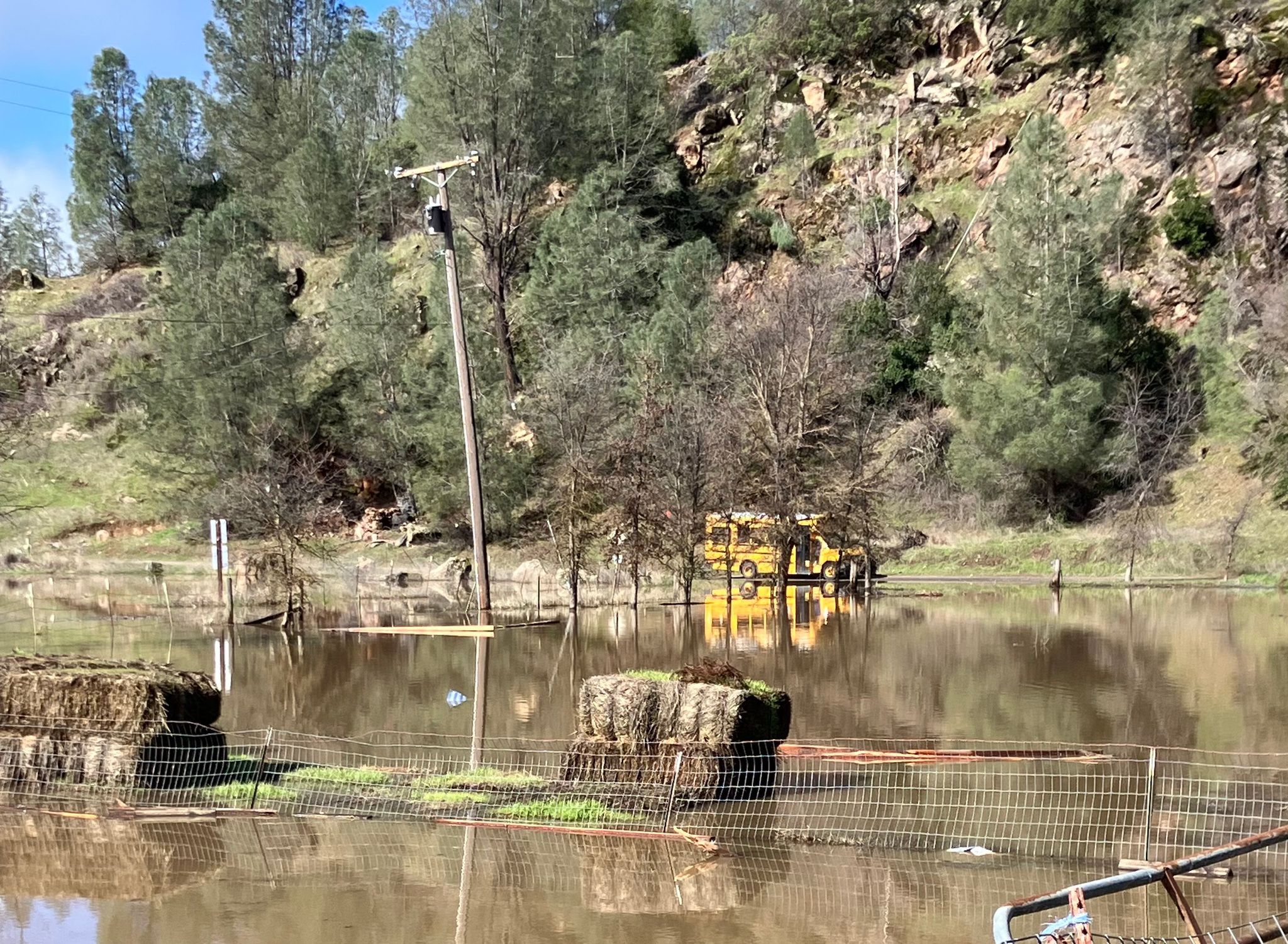 School bus is unable to access the road while it is flooded (February 2024)